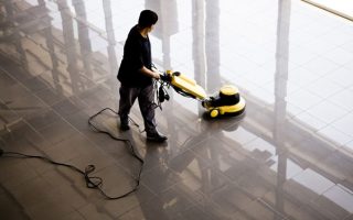 A man performing a contract cleaning service across different sites, and checking that each site is cleaned to the highest standard possible.